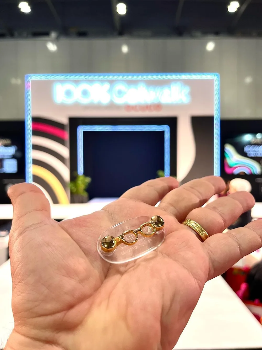 MagTag Lovers in the palm of a hand at the Love Eyewear Awards